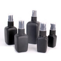 square 50ml glass bottle black colored with pump cap